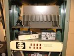 Repeater controller on the bottom, unknown equipment in the middle, GE Mastr II transmit radio on top.
