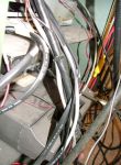 Lower rear of the cabinet.  There's a Motorola Micor at the bottom, possibly the UHF radio for the Superlink link.
