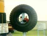 Unknown people in a big tire
