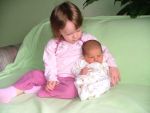 Elyzabeth Marcella (2 years), Jennifer Paige (1 week).  Daughters of Dave and Heather Fischer.  Picture taken 4/11/2005