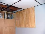 Plywood backing attached to wall