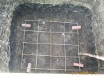 Rebar in the bottom of the slab.  I dug the hole 5x5x5 because it's on sloped ground.